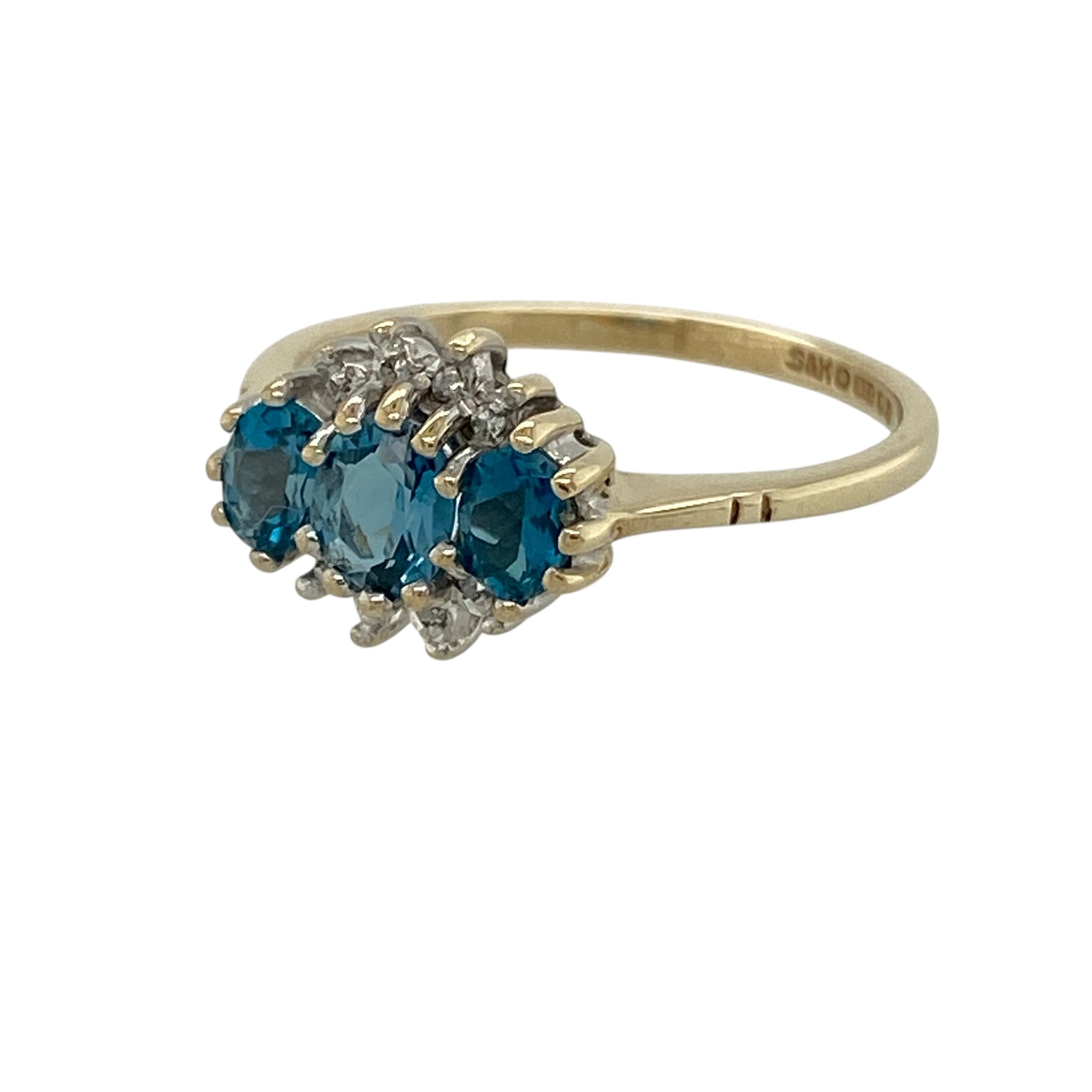 Bring elegant colour and timeless style to your collection with this pre-owned 9ct yellow gold blue topaz trilogy ring, featuring a classic design with graceful appeal—perfect for everyday wear or special occasions.

Design: The ring showcases three oval blue topaz stones, each measuring approximately 5mm by 4mm, arranged in a traditional trilogy setting that creates a balanced and eye-catching look.