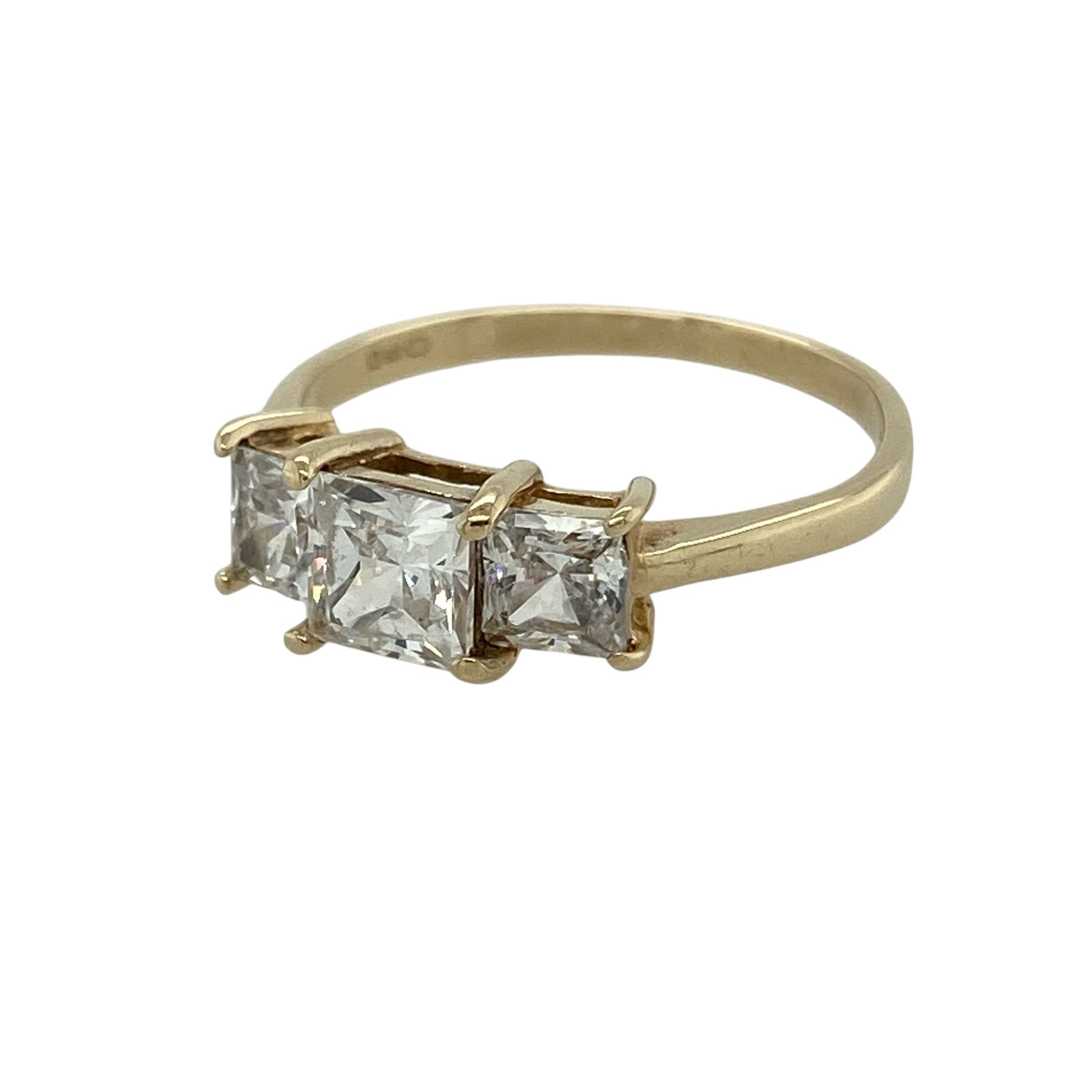 Bring elegant sparkle and timeless style to your jewellery collection with this pre-owned 9ct yellow gold cubic zirconia trilogy ring, featuring striking square-cut stones and a classic three-stone design—perfect for everyday wear, special occasions, or as a meaningful gift.

Design: The ring features a 5mm by 5mm square-cut cubic zirconia centre stone, complemented by two matching 4mm by 4mm square-cut cubic zirconia stones on either side