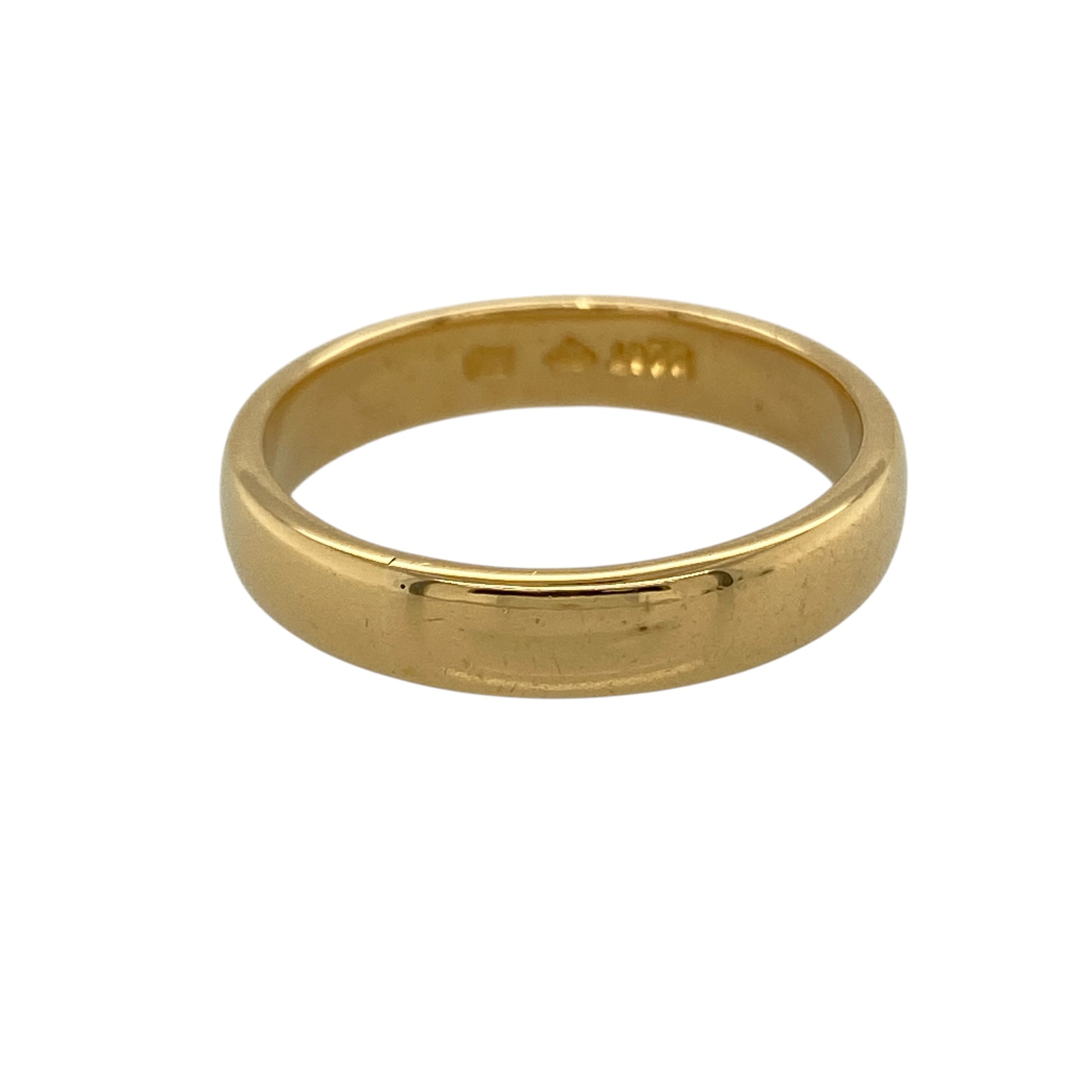 Celebrate timeless style and lasting quality with this pre-owned 22ct yellow gold wedding band ring, featuring a classic polished finish and substantial feel—perfect as a traditional wedding ring or elegant everyday jewellery piece.

Design: The ring features a traditional plain band design with a smooth polished finish and a classic 4mm width, offering a clean and timeless look suitable for both everyday wear and special occasions.