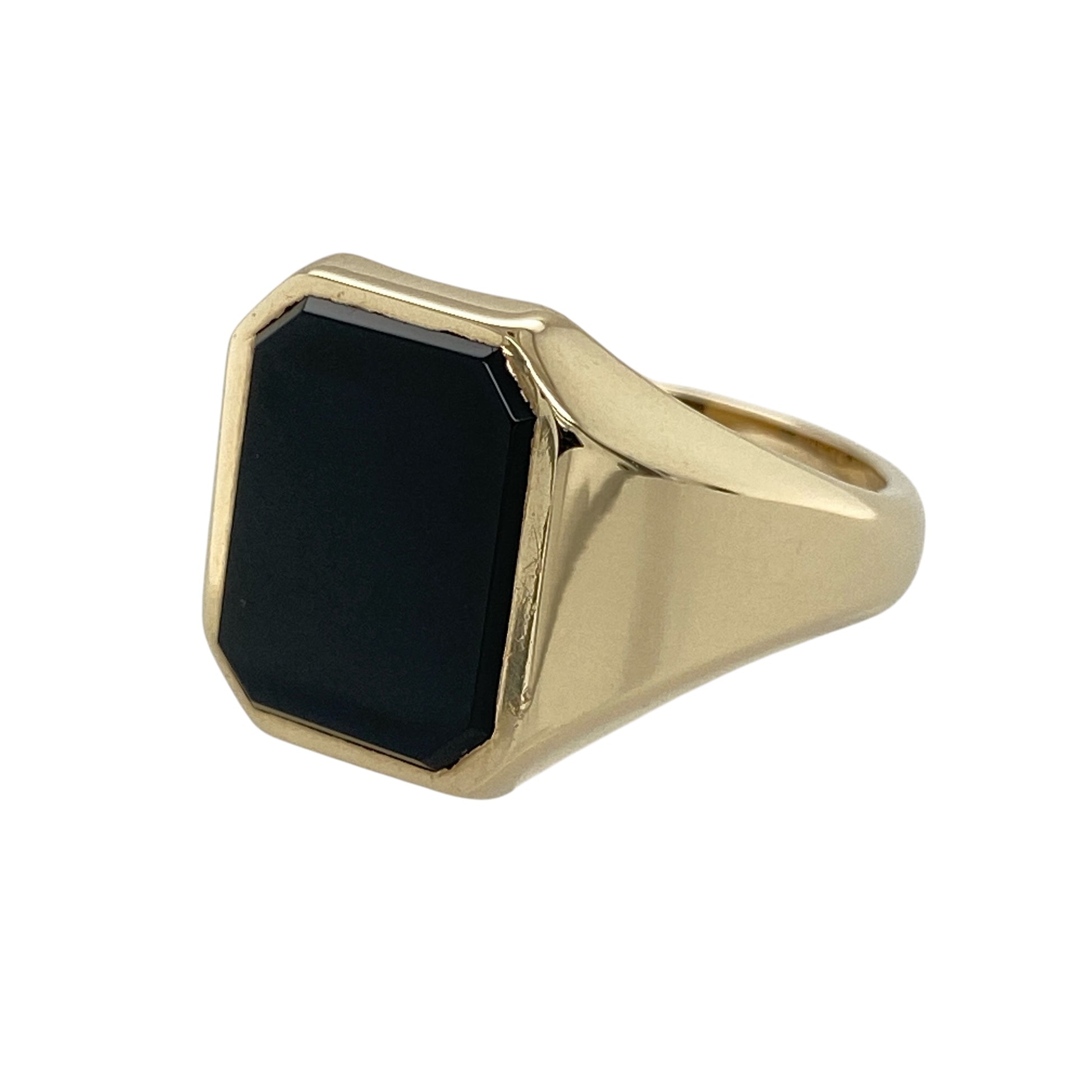 Add bold vintage-inspired style to your jewellery collection with this pre-owned 9ct yellow gold onyx set signet ring, featuring a striking rectangular black onyx stone with timeless statement appeal—perfect for everyday wear, formal occasions, or classic jewellery styling.

Design: The ring showcases a polished rectangular onyx stone measuring approximately 13mm by 10mm, creating a bold and eye-catching focal point within the traditional signet ring design.