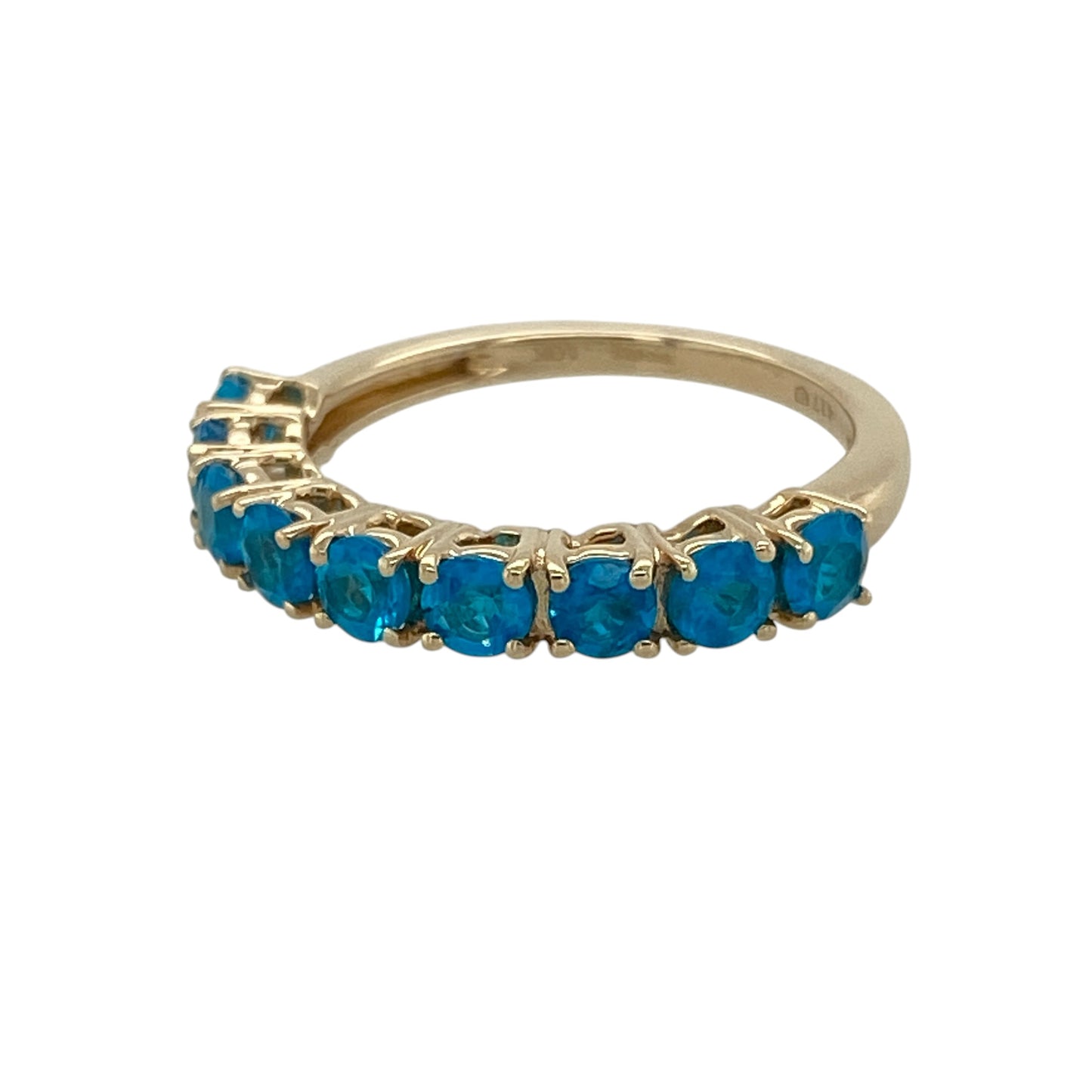 Add a touch of vibrant colour to your jewellery collection with this pre-owned 9ct yellow gold blue stone set band ring, featuring a classic multi-stone design with timeless everyday appeal—perfect for stacking, special occasions, or elegant daily wear.

Design: The ring features a row of sparkling blue stones, each measuring approximately 3mm in diameter, creating a refined and eye-catching band design with rich colour and subtle brilliance.