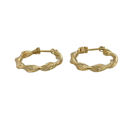 Add timeless elegance to your jewellery collection with these pre-owned 9ct yellow gold twisted hoop creole earrings, featuring a classic textured design with versatile everyday appeal—perfect for casual wear, occasion styling, or layering with other gold jewellery.

Design: The earrings feature a traditional hoop creole style with elegant twisted detailing, creating subtle texture and light-catching shine for a refined and eye-catching look.