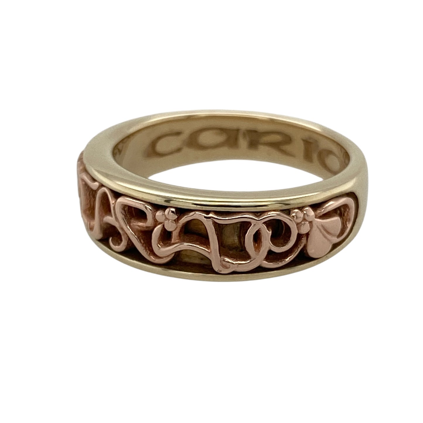 Celebrate timeless Welsh-inspired elegance with this pre-owned 9ct yellow and rose gold Clogau Cariad band ring, featuring a beautifully detailed design with meaningful everyday appeal—perfect for gifting, anniversaries, or sophisticated daily wear.

Design: The ring features the iconic Clogau Cariad design with elegant detailing across the band, measuring approximately 6mm wide at the front for a refined yet noticeable appearance.