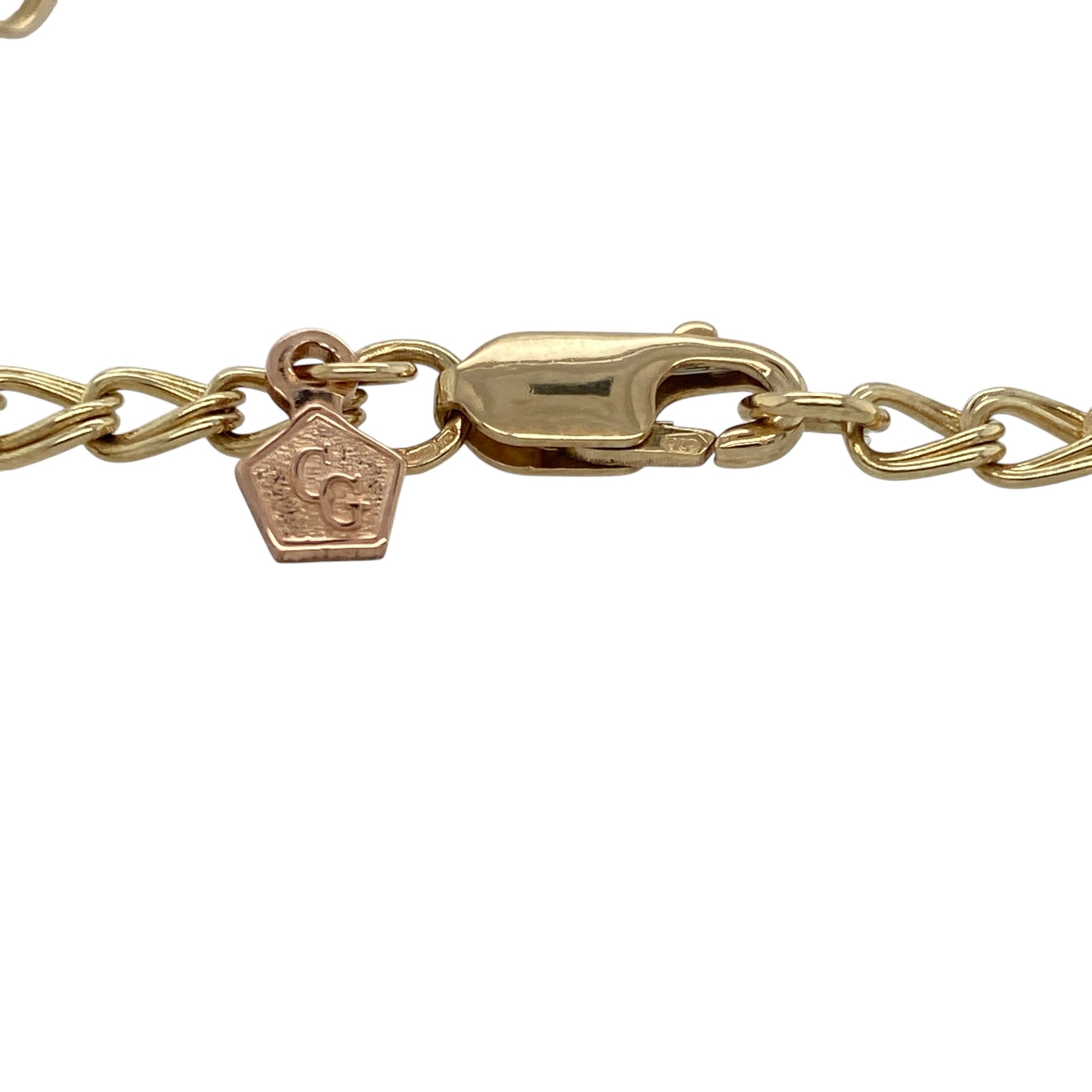 Celebrate Welsh heritage and timeless style with this pre-owned 9ct yellow and rose gold Clogau charm bracelet, featuring meaningful symbolic charms with elegant two-tone detailing—perfect for gifting, collecting, or everyday wear with sentimental appeal.

Design: The bracelet features a classic charm bracelet design adorned with detailed daffodil, Tree of Life, and Welsh dragon charms, creating a distinctive and eye-catching piece rich in symbolism and heritage-inspired style.