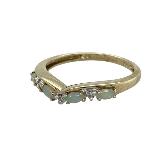 Add delicate colour and timeless elegance to your jewellery collection with this pre-owned 9ct yellow gold diamond and opal wishbone ring, featuring a graceful shaped design with luminous opal detail—perfect for stacking, everyday wear, or meaningful gifting.

Design: The ring features a classic wishbone shape with marquise-cut opal stones measuring approximately 4mm by 2mm each, accented by delicate diamond detailing for subtle sparkle.