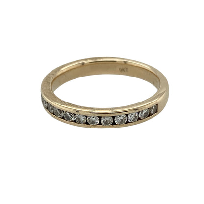 Add timeless sparkle and understated elegance to your jewellery collection with this pre-owned 9ct yellow gold diamond set band ring, featuring a classic slim profile with versatile everyday appeal—perfect for stacking, special occasions, or elegant daily wear.

Design: The ring features a refined band design accented with sparkling diamonds, creating a timeless and sophisticated look. Measuring approximately 3mm wide, the slim profile offers elegant and versatile styling suitable for any occasion.