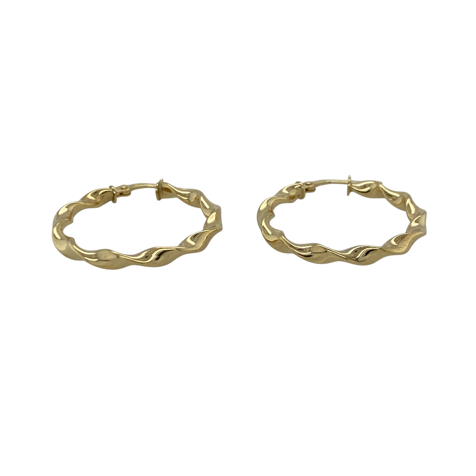 Add timeless elegance to your jewellery collection with these pre-owned 9ct yellow gold twisted hoop creole earrings, featuring a classic textured design with versatile everyday appeal—perfect for casual wear, occasion styling, or layering with other gold jewellery.

Design: The earrings feature a traditional hoop creole style with elegant twisted detailing, creating subtle texture and light-catching shine for a refined and eye-catching look.