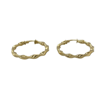 Add timeless elegance to your jewellery collection with these pre-owned 9ct yellow gold twisted hoop creole earrings, featuring a classic textured design with versatile everyday appeal—perfect for casual wear, occasion styling, or layering with other gold jewellery.

Design: The earrings feature a traditional hoop creole style with elegant twisted detailing, creating subtle texture and light-catching shine for a refined and eye-catching look.