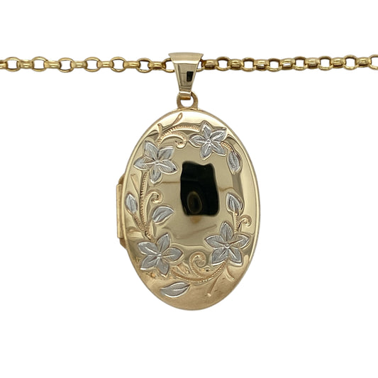 Add timeless elegance and sentimental charm to your jewellery collection with this pre-owned 9ct yellow and white gold flower patterned oval locket necklace, featuring beautiful two-tone detailing and classic vintage-inspired appeal—perfect for gifting, everyday wear, or keeping treasured memories close.

Design: The necklace features a large oval locket adorned with an attractive flower pattern, enhanced by contrasting yellow and white gold detailing for a striking and elegant appearance.