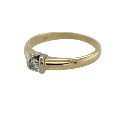 Add timeless elegance and understated luxury to your jewellery collection with this pre-owned 18ct yellow gold diamond set solitaire ring, featuring a classic single stone design with enduring appeal—perfect for engagements, anniversaries, or sophisticated everyday wear.

Design: The ring showcases a sparkling brilliant cut solitaire diamond weighing approximately 0.15ct, creating a refined and elegant focal point with beautiful light-catching brilliance.