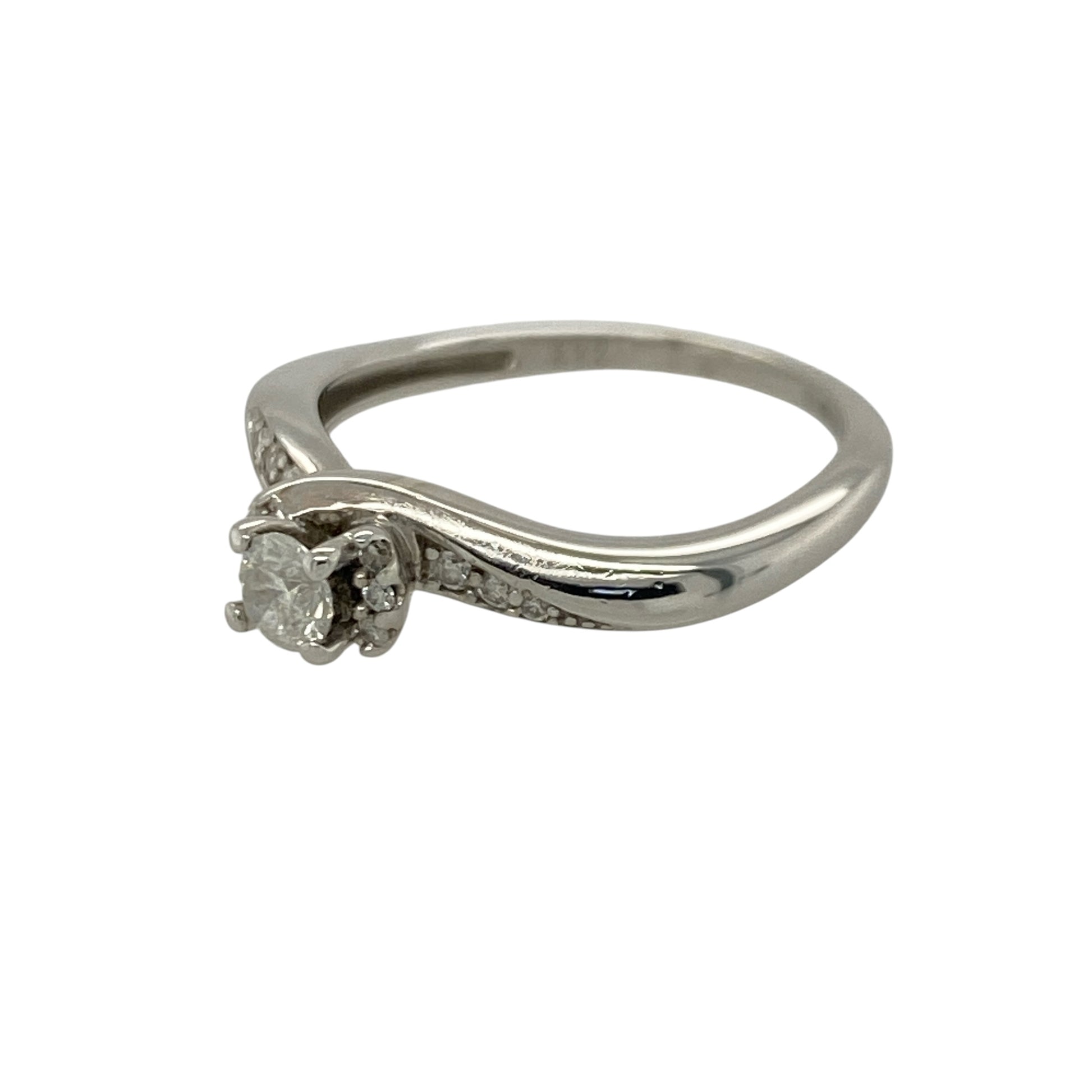 Add timeless sparkle and elegant sophistication to your jewellery collection with this pre-owned 9ct white gold diamond set solitaire ring, featuring a classic centre stone design with dazzling diamond-set shoulders—perfect for engagements, anniversaries, or luxurious everyday wear.

Design: The ring showcases a sparkling brilliant cut centre diamond complemented by diamond-set shoulders, creating a refined and eye-catching look with beautiful light-catching brilliance.