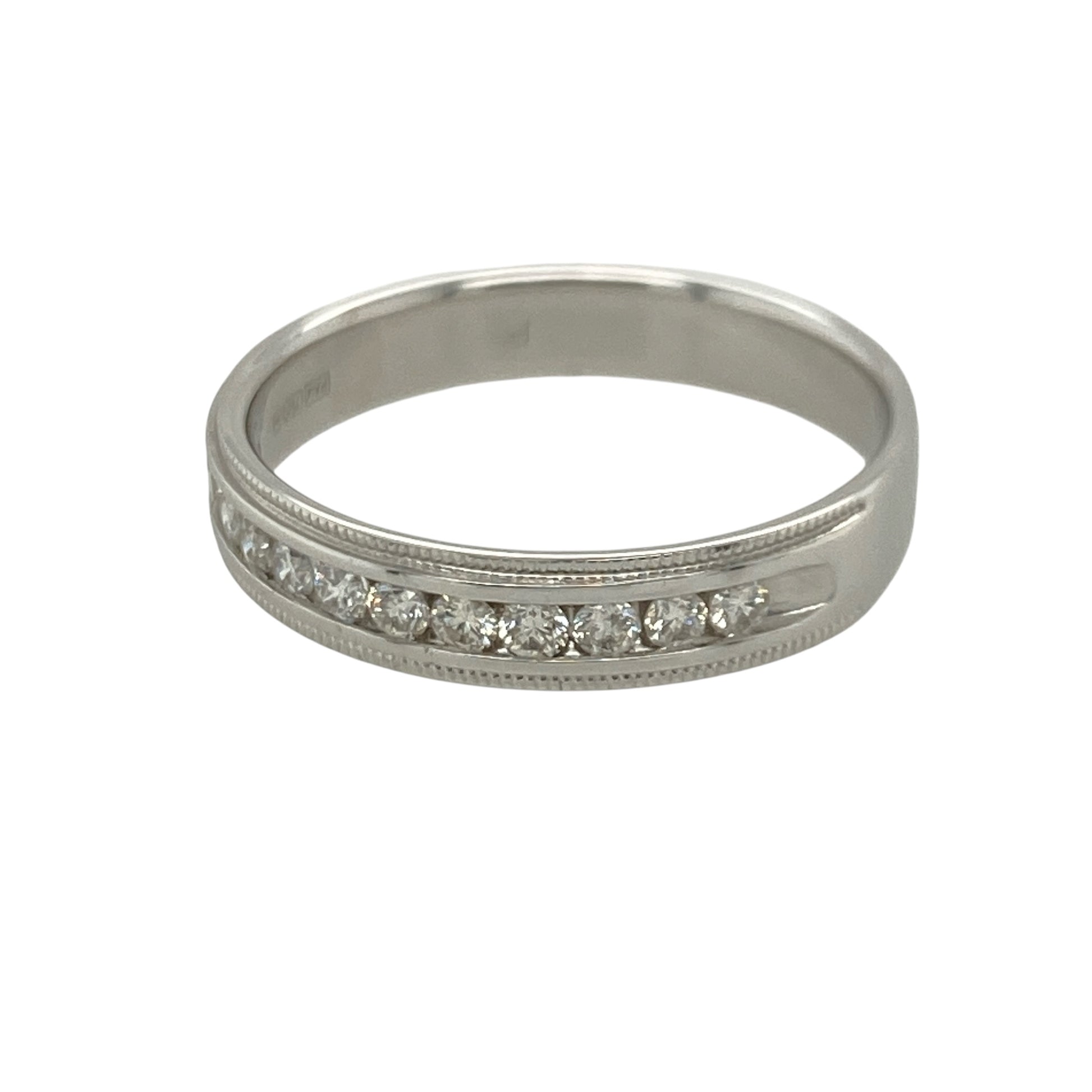 Add timeless elegance and vintage-inspired sparkle to your jewellery collection with this pre-owned 18ct white gold diamond set band ring, featuring classic milgrain detailing and refined everyday appeal—perfect for anniversaries, stacking, or sophisticated daily wear.

Design: The ring features a polished 4mm wide band accented with sparkling diamonds, creating a clean and elegant look with timeless style.