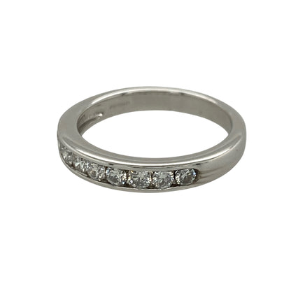Add timeless sparkle and elegant simplicity to your jewellery collection with this pre-owned 18ct white gold diamond set band ring, featuring a refined design with versatile everyday appeal—perfect for stacking, anniversaries, or sophisticated daily wear.

Design: The ring features a sleek band design accented with sparkling diamonds across the front, creating a classic and elegant look. The front of the band measures approximately 3mm wide, offering a refined and delicate appearance.