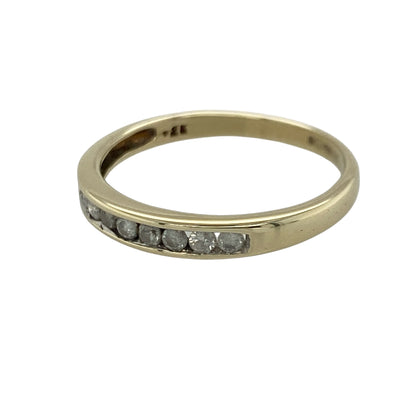 Add timeless sparkle and elegant sophistication to your jewellery collection with this pre-owned 9ct yellow gold diamond set band ring, featuring a classic design with impressive brilliance and versatile everyday appeal—perfect for anniversaries, stacking, or special occasions.

Design: The ring features a refined band design measuring approximately 3mm wide at the front, accented with sparkling diamonds that create a beautifully balanced and elegant look. With approximately 0.25ct of total diamond content