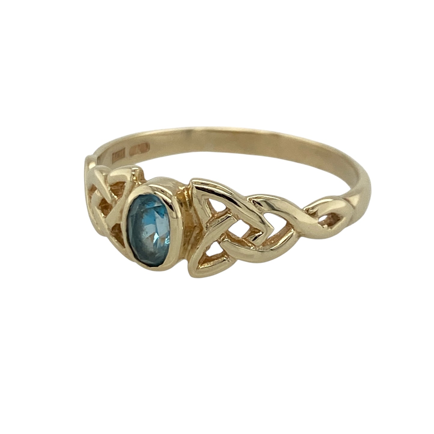 Add timeless Celtic-inspired elegance to your jewellery collection with this pre-owned 9ct yellow gold blue topaz Celtic ring, featuring intricate detailing and a vibrant gemstone with classic everyday appeal—perfect for gifting, special occasions, or meaningful wear.

Design: The ring showcases a beautiful oval blue topaz stone measuring approximately 6mm by 4mm, complemented by intricate Celtic-inspired detailing that creates a distinctive and eye-catching appearance.