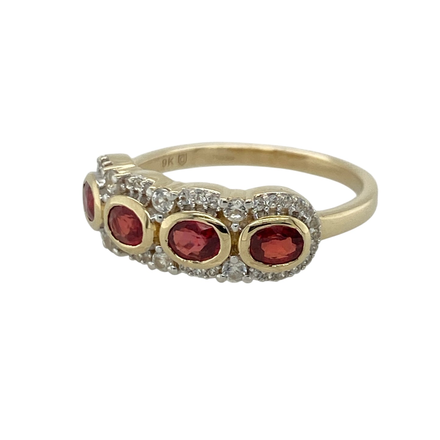 Add rich colour and elegant sparkle to your jewellery collection with this pre-owned 9ct yellow gold red stone and cubic zirconia band ring, featuring a bold gemstone design with timeless everyday appeal—perfect for special occasions, gifting, or statement styling.

Design: The ring features vibrant red stones measuring approximately 4mm by 3mm each, complemented by sparkling cubic zirconia accents across a band measuring approximately 6mm wide at the front.
