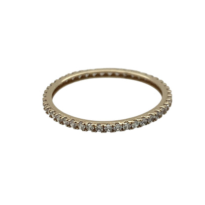 Add timeless sparkle and delicate elegance to your jewellery collection with this pre-owned 9ct yellow gold cubic zirconia eternity band ring, featuring a classic full eternity design with refined everyday appeal—perfect for stacking, gifting, or celebrating a special occasion.

Design: The ring features sparkling cubic zirconia stones set all the way around the band, creating a continuous circle of brilliance.