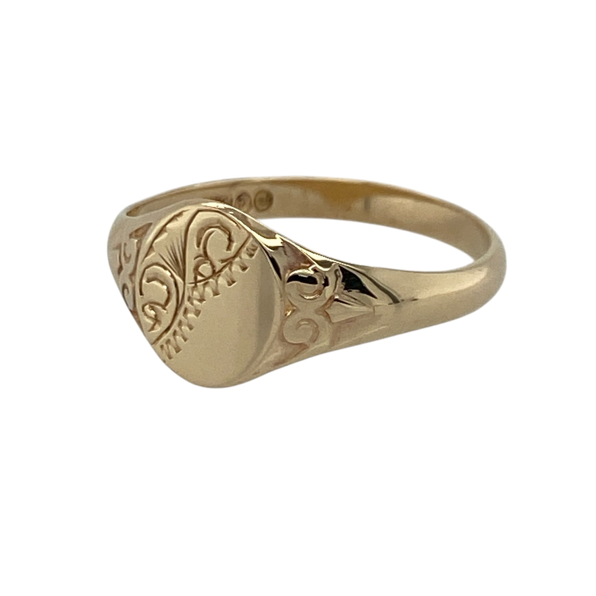 Add classic vintage-inspired style to your jewellery collection with this pre-owned 9ct yellow gold patterned oval signet ring, featuring traditional detailing and timeless everyday appeal—perfect for gifting, formal wear, or heritage-inspired jewellery styling.

Design: The ring showcases a classic oval signet front measuring approximately 9mm high, enhanced with attractive patterned detailing that adds character and distinctive charm to the design.
