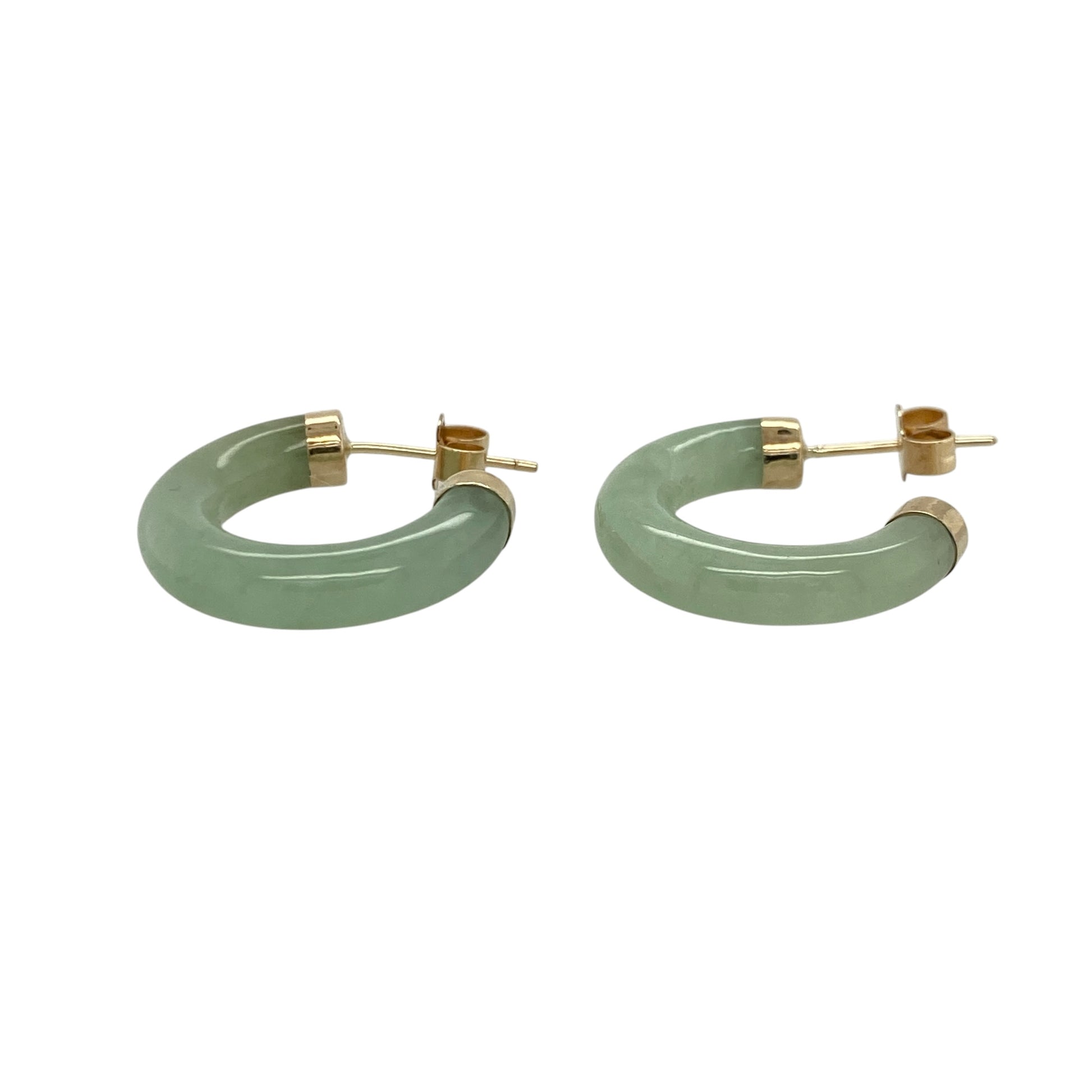 Add timeless elegance and natural beauty to your jewellery collection with these pre-owned 9ct yellow gold jade hoop earrings, featuring a classic hoop design with rich green gemstone detail—perfect for everyday wear, gifting, or sophisticated occasion styling.

Design: The earrings feature an elegant hoop design accented with jade, creating a distinctive and eye-catching look that combines classic gold jewellery styling with natural gemstone appeal. The stud fastening provides a secure and comfortable fit.