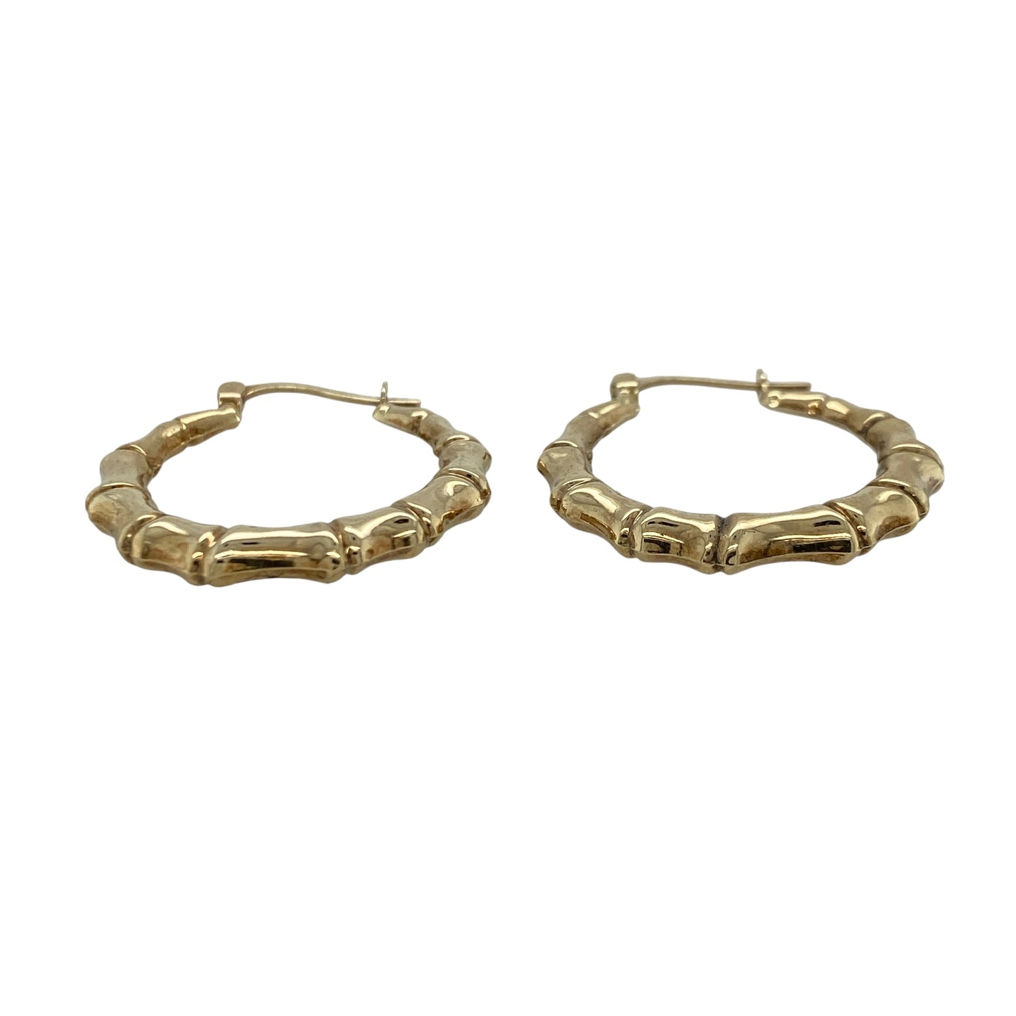 Add timeless style and distinctive texture to your jewellery collection with these pre-owned 9ct yellow gold bamboo creole earrings, featuring a classic hoop design inspired by natural bamboo detailing—perfect for everyday wear, gifting, or effortless occasion styling.

Design: The earrings feature a traditional creole hoop design with bamboo-inspired detailing throughout, creating a textured and eye-catching look. Measuring approximately 27mm in diameter