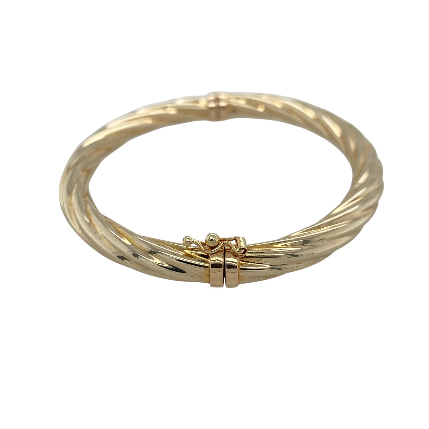 Add timeless elegance and classic sophistication to your jewellery collection with this pre-owned 9ct yellow gold twisted hinged bangle, featuring beautiful textured detailing and versatile everyday appeal—perfect for special occasions, gifting, or effortless daily wear.

Design: The bangle features an attractive twisted design that creates a beautiful light-catching effect and adds texture to the classic gold bangle style.