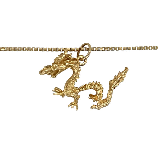 Add bold character and symbolic style to your jewellery collection with this pre-owned 14ct yellow gold dragon pendant necklace, featuring an intricately detailed mythical design with timeless statement appeal—perfect for collectors, gifting, or everyday wear with personality.

Design: The necklace features a detailed dragon pendant measuring approximately 17mm by 23mm, creating a striking focal point with impressive craftsmanship and eye-catching presence.