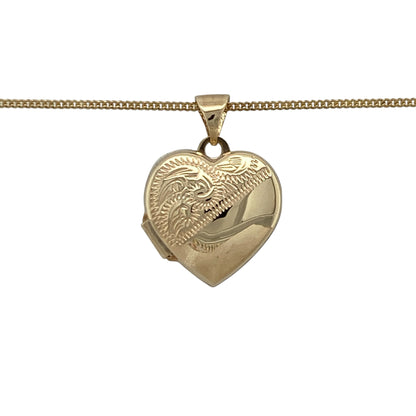 Add timeless romance and sentimental charm to your jewellery collection with this pre-owned 9ct yellow gold patterned heart locket necklace, featuring elegant detailing and classic everyday appeal—perfect for gifting, special occasions, or keeping treasured memories close.

Design: The necklace features a beautifully patterned heart-shaped locket measuring approximately 2.2cm in length including the bail.