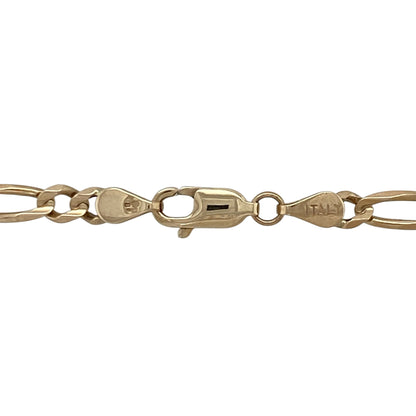 Add bold Italian-inspired style to your jewellery collection with this pre-owned 9ct yellow gold Figaro chain, featuring a classic alternating link design with timeless everyday appeal—perfect for wearing alone, layering, or making a statement with effortless sophistication.

Design: The chain features the traditional Figaro link pattern with alternating short and elongated links measuring approximately 4mm wide, creating a distinctive and eye-catching appearance with timeless character.