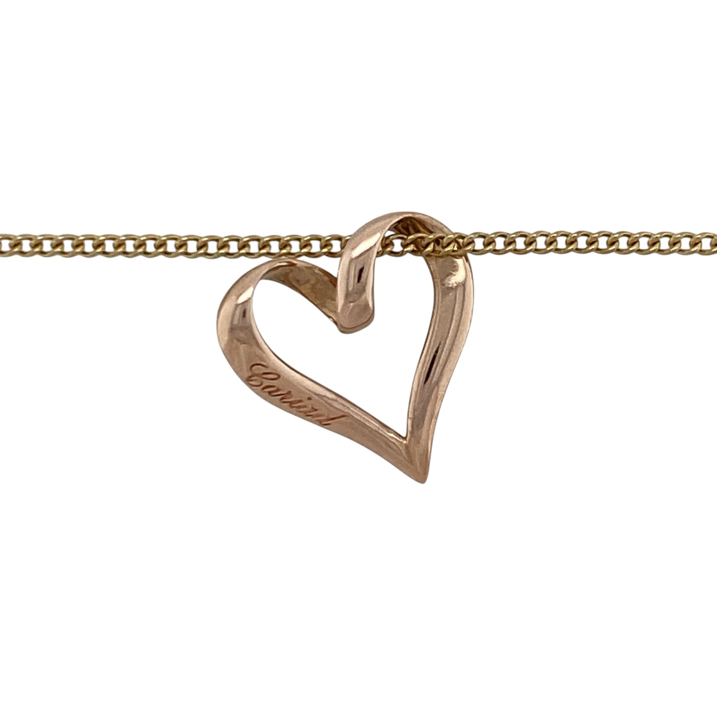 Add a touch of romance and Welsh heritage to your jewellery collection with this pre-owned 9ct rose gold Clogau Cariad Open Heart pendant necklace, featuring an elegant symbolic design with timeless everyday appeal—perfect for gifting, anniversaries, or meaningful everyday wear.

Design: The necklace features Clogau's beautiful Cariad Open Heart pendant, measuring approximately 1.6cm in length. The graceful open heart design creates a delicate and elegant appearance, symbolising love and affection.