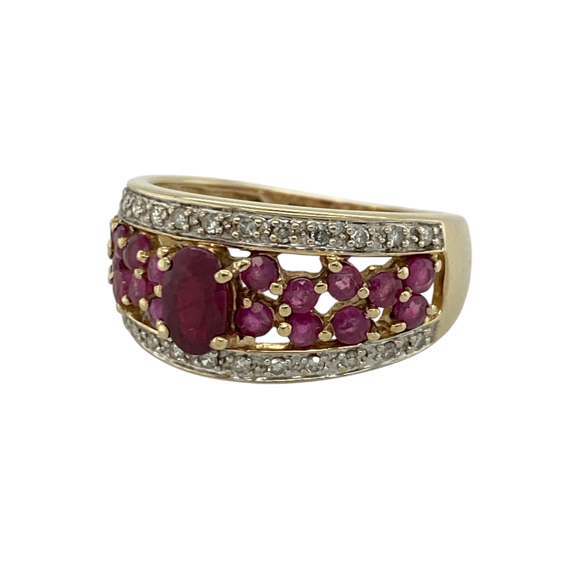 Add luxurious colour and timeless sparkle to your jewellery collection with this pre-owned 9ct yellow gold diamond and ruby wide band ring, featuring a striking multi-stone design with elegant statement appeal—perfect for special occasions, gifting, or sophisticated everyday wear.

Design: The ring features a bold wide band design measuring approximately 10mm wide at the front, showcasing a beautiful oval ruby centre stone measuring approximately 6mm by 4mm.