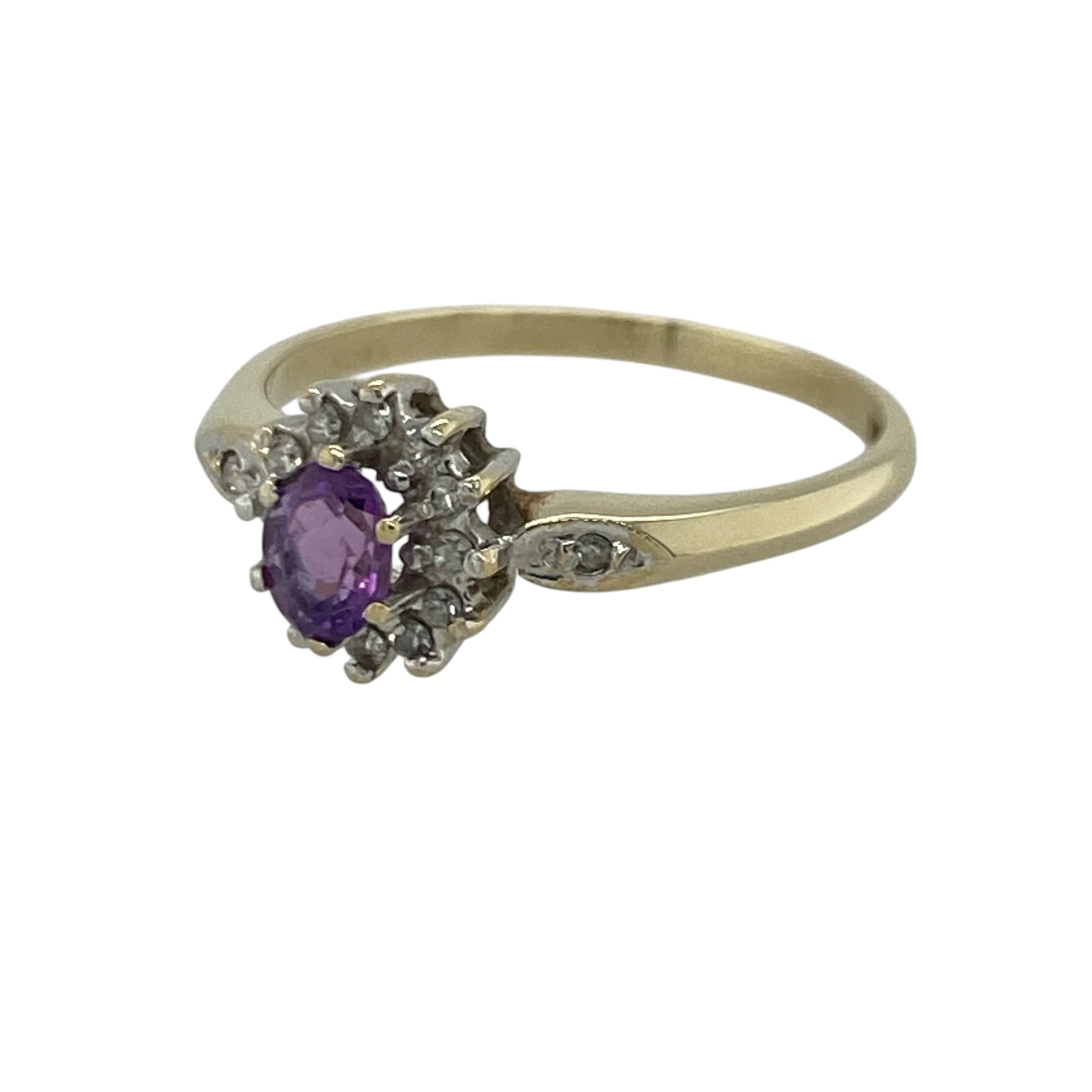 Add rich colour and timeless sparkle to your jewellery collection with this pre-owned 9ct yellow gold diamond and amethyst cluster ring, featuring a classic gemstone design with elegant everyday appeal—perfect for special occasions, gifting, or sophisticated daily wear.

Design: The ring showcases a beautiful oval amethyst centre stone measuring approximately 5mm by 4mm, surrounded by sparkling diamonds in an elegant cluster setting.