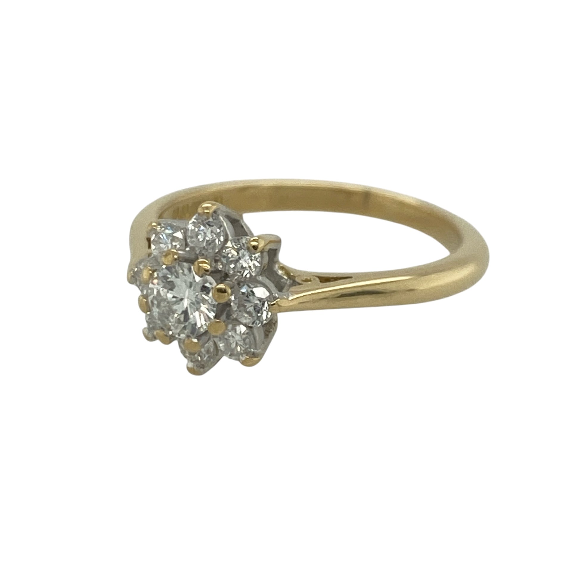 Add timeless sparkle and elegant sophistication to your jewellery collection with this pre-owned 18ct yellow gold diamond cluster ring, featuring a beautifully balanced design with impressive brilliance—perfect for special occasions, gifting, or luxurious everyday wear.

Design: The ring showcases a stunning diamond cluster arrangement measuring approximately 9mm high at the front, creating an eye-catching focal point with exceptional sparkle.