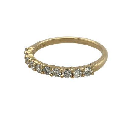 Add exceptional sparkle and timeless elegance to your jewellery collection with this pre-owned 18ct yellow gold ten stone diamond band ring, featuring a luxurious multi-stone design with enduring appeal—perfect for anniversaries, special occasions, or sophisticated everyday wear.

Design: The ring showcases ten sparkling diamonds set across the band, creating a beautifully balanced and eye-catching display of brilliance.