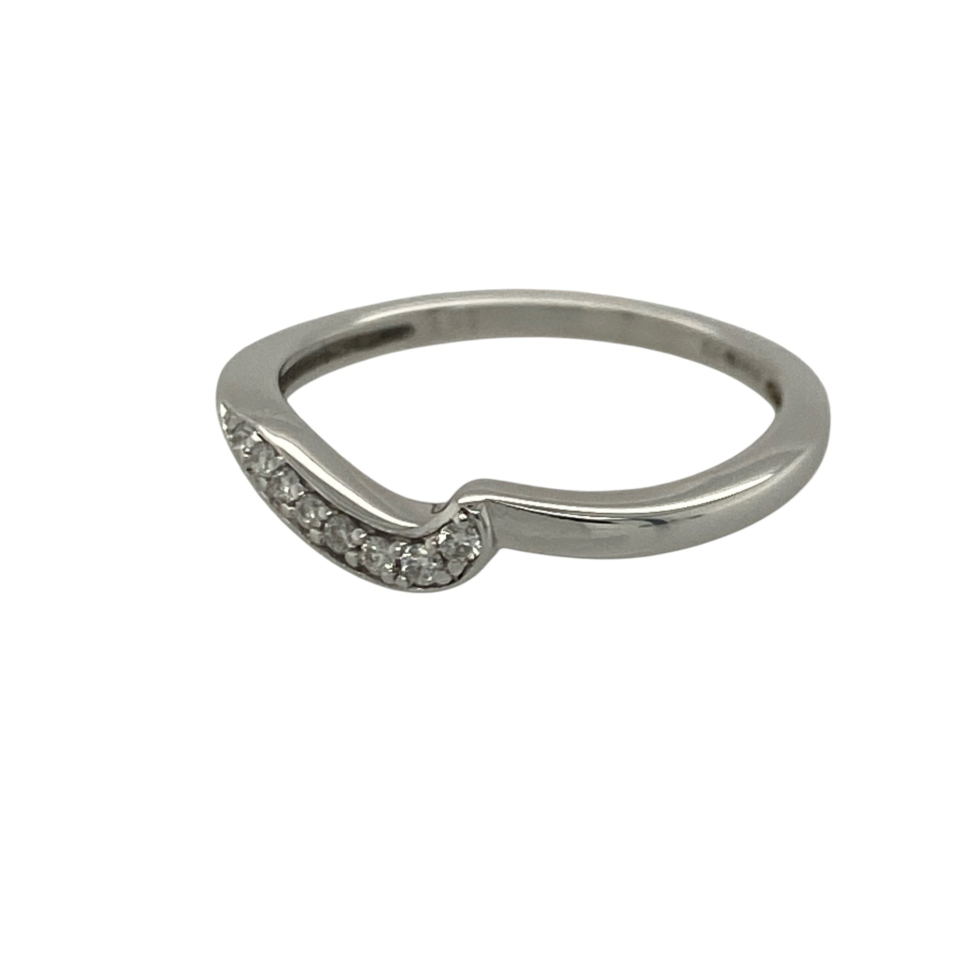 Add delicate sparkle and contemporary elegance to your jewellery collection with this pre-owned 9ct white gold diamond wave band ring, featuring a graceful flowing design with timeless everyday appeal—perfect for stacking, gifting, or sophisticated daily wear.

Design: The ring features an elegant wave-shaped band measuring approximately 2mm wide, accented with sparkling diamonds that add subtle brilliance to the flowing design.
