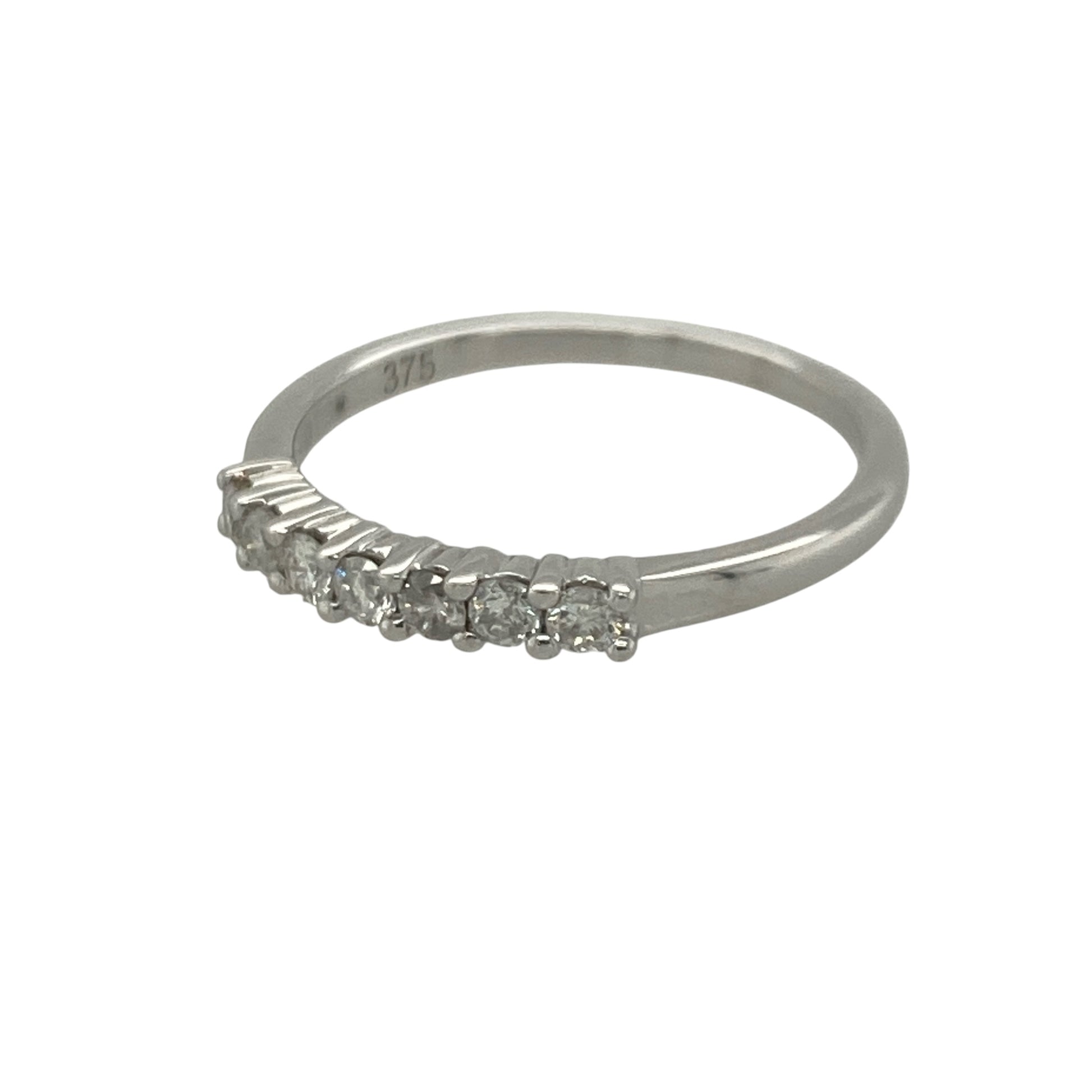 Add timeless sparkle and elegant sophistication to your jewellery collection with this pre-owned 9ct white gold seven stone diamond band ring, featuring a classic multi-stone design with refined everyday appeal—perfect for anniversaries, stacking, or special occasions.

Design: The ring showcases seven sparkling diamonds set across the front of the band, creating a beautifully balanced and eye-catching display of brilliance.