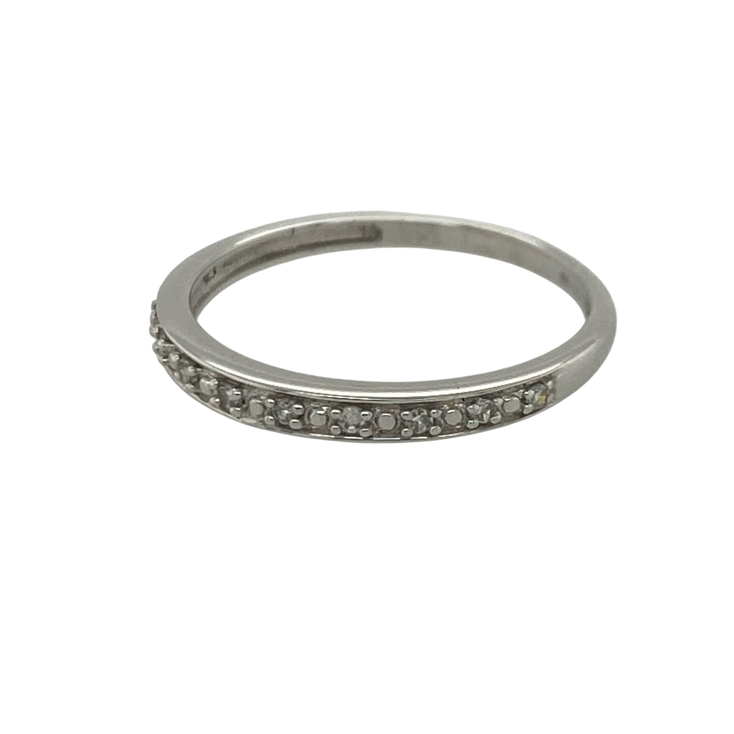 Add timeless sparkle and understated elegance to your jewellery collection with this pre-owned 9ct white gold seven stone diamond band ring, featuring a classic multi-stone design with refined everyday appeal—perfect for stacking, anniversaries, or sophisticated daily wear.

Design: The ring showcases seven sparkling diamonds set across the front of the band, creating a beautifully balanced and elegant display of brilliance.