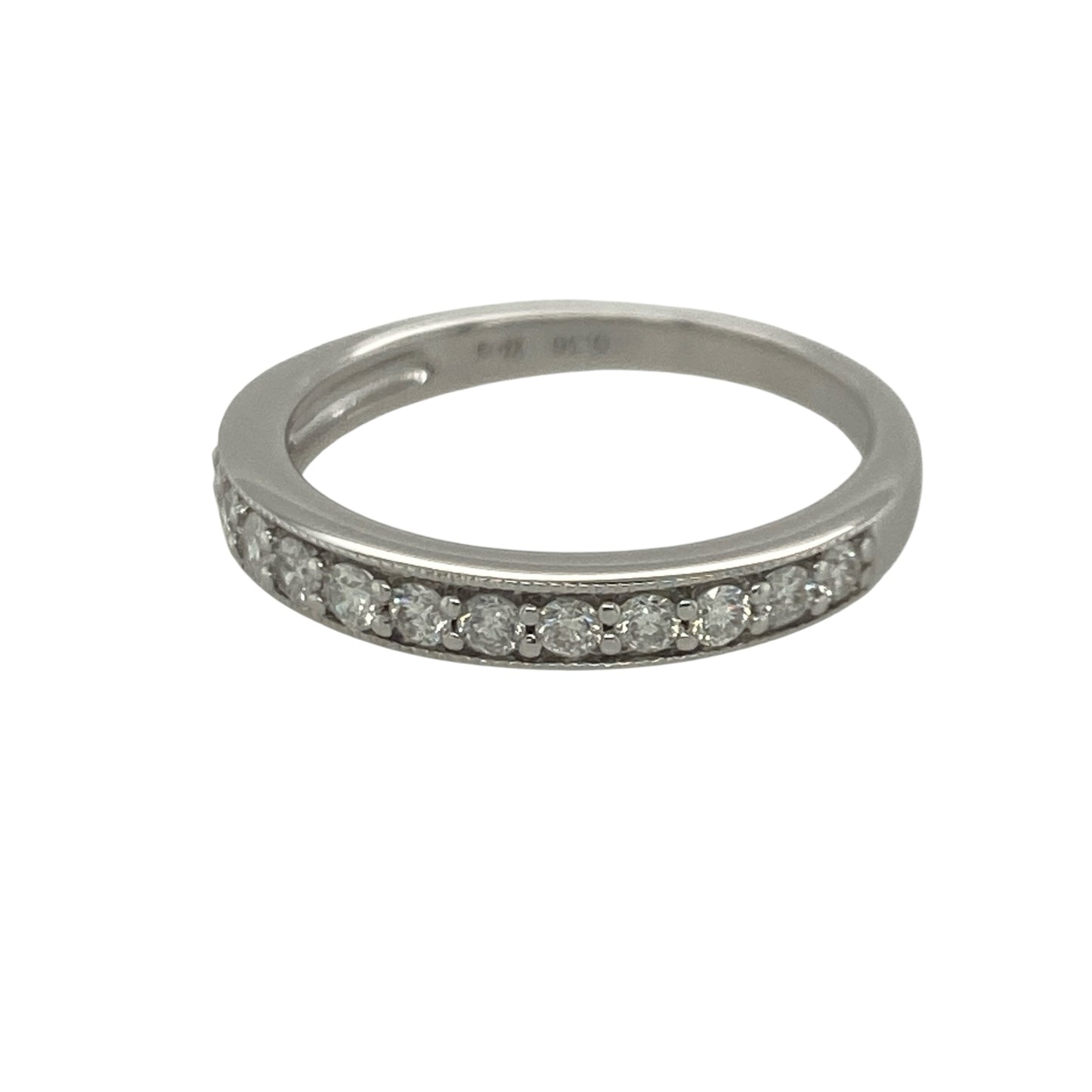 Add timeless sparkle and vintage-inspired elegance to your jewellery collection with this pre-owned 18ct white gold seven stone diamond band ring, featuring classic milgrain detailing and impressive brilliance—perfect for anniversaries, stacking, or sophisticated everyday wear.

Design: The ring showcases seven sparkling diamonds set across the front of the band, creating a beautifully balanced display of brilliance.