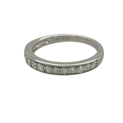 Add timeless sparkle and vintage-inspired elegance to your jewellery collection with this pre-owned 18ct white gold seven stone diamond band ring, featuring classic milgrain detailing and impressive brilliance—perfect for anniversaries, stacking, or sophisticated everyday wear.

Design: The ring showcases seven sparkling diamonds set across the front of the band, creating a beautifully balanced display of brilliance.