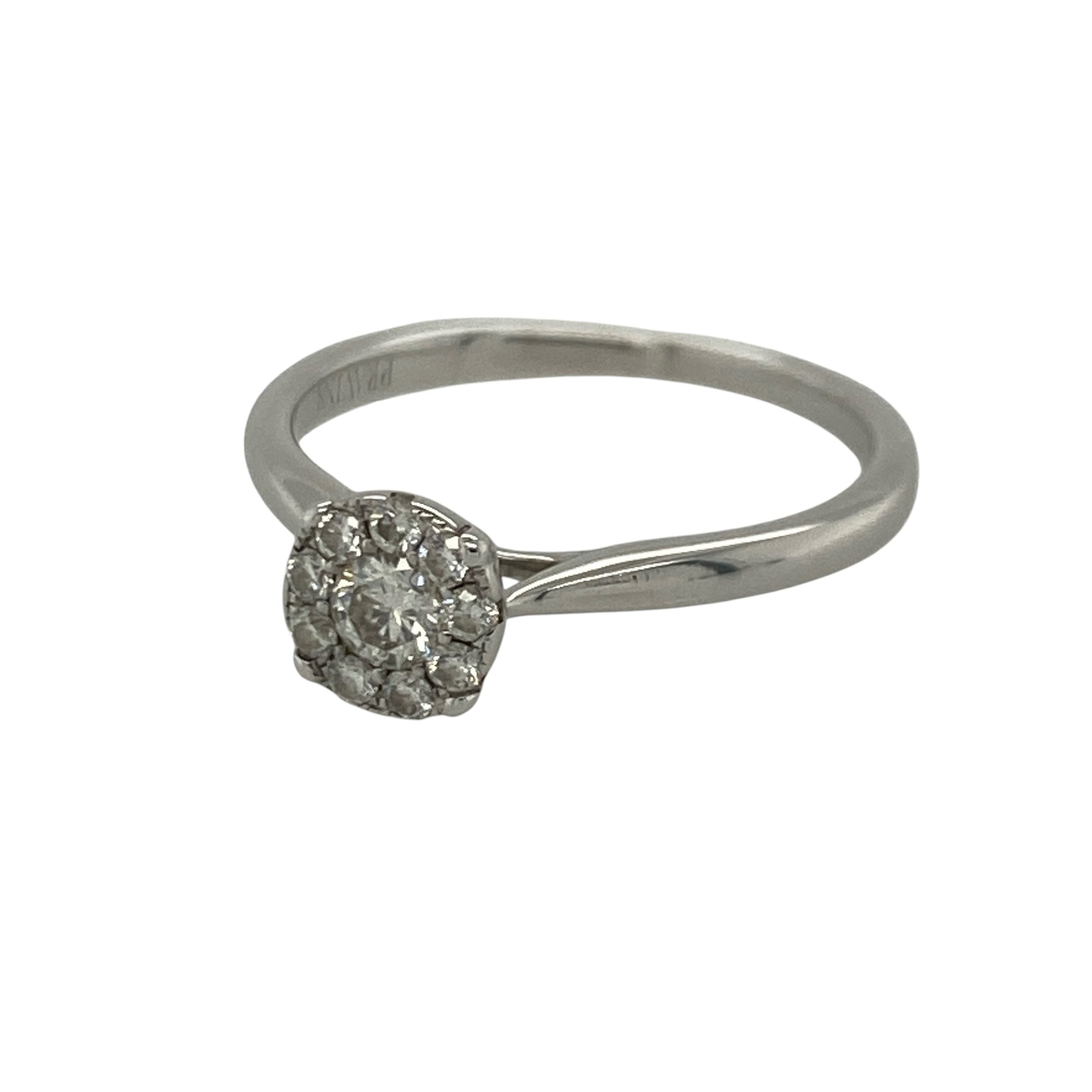 Add timeless sparkle and elegant sophistication to your jewellery collection with this pre-owned 18ct white gold diamond cluster ring, featuring an illusion-set halo design that maximises brilliance and creates a beautifully eye-catching appearance—perfect for special occasions, gifting, or luxurious everyday wear.

Design: The ring showcases an illusion-set solitaire-style halo cluster measuring approximately 6mm in diameter, creating the appearance of a larger centre diamond