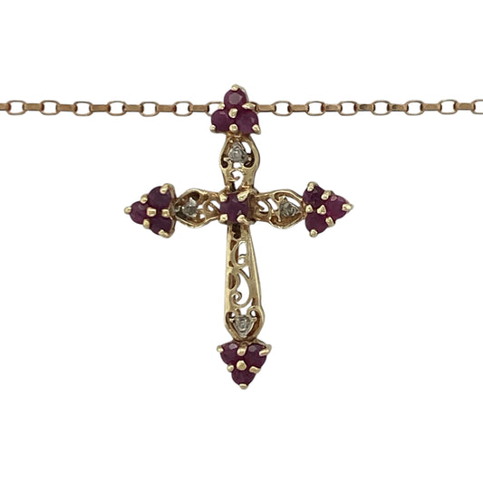 Add meaningful elegance and vintage-inspired charm to your jewellery collection with this pre-owned 9ct yellow gold diamond and ruby filigree style cross pendant necklace, featuring intricate detailing with timeless faith-inspired appeal—perfect for gifting, special occasions, or everyday wear.

Design: The necklace features a beautifully detailed filigree style cross pendant measuring approximately 2.7cm in length.