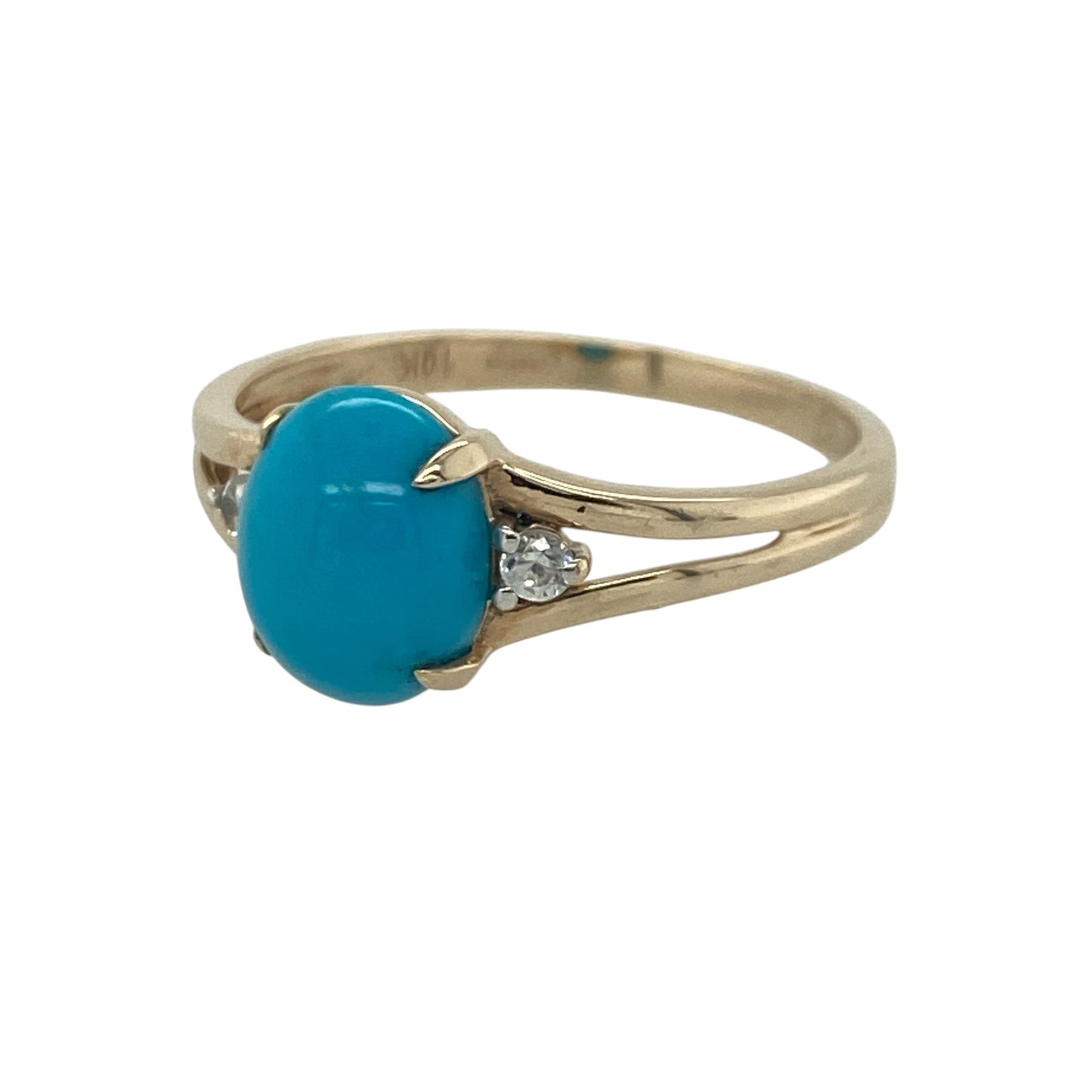 Add vibrant colour and timeless elegance to your jewellery collection with this pre-owned 9ct yellow gold turquoise-coloured stone and cubic zirconia ring, featuring a classic three-stone design with refined everyday appeal—perfect for special occasions, gifting, or stylish daily wear.

Design: The ring showcases a beautiful oval turquoise-coloured stone measuring approximately 9mm by 7mm, creating a striking focal point with its vibrant hue.