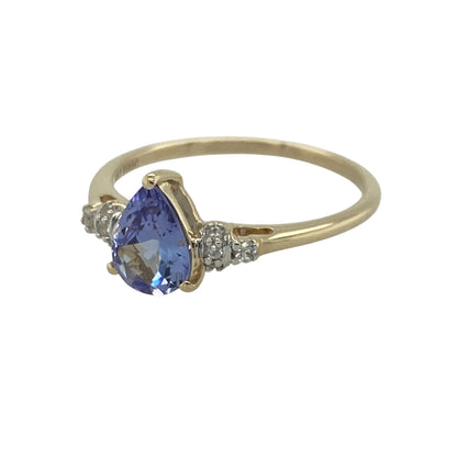 Add elegant colour and timeless sparkle to your jewellery collection with this pre-owned 9ct yellow gold tanzanite and cubic zirconia ring, featuring a graceful gemstone design with sophisticated everyday appeal—perfect for special occasions, gifting, or refined daily wear.

Design: The ring showcases a beautiful teardrop-shaped tanzanite stone measuring approximately 8mm by 6mm, creating a striking focal point with its captivating violet-blue colour.