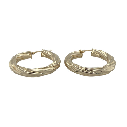 Add timeless elegance to your jewellery collection with these pre-owned 9ct yellow gold twisted hoop creole earrings, featuring a classic design with beautiful texture and versatile everyday appeal—perfect for special occasions, gifting, or effortless daily wear.

Design: The earrings feature a stylish twisted hoop creole design that catches the light beautifully from every angle.