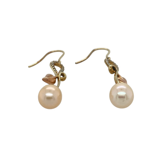 Add a touch of Welsh heritage and timeless elegance to your jewellery collection with these pre-owned 9ct yellow and rose gold Clogau Tree of Life diamond and pearl drop earrings, featuring the iconic Tree of Life design with luxurious gemstone detail—perfect for special occasions, gifting, or sophisticated everyday wear.

Design: The earrings feature Clogau's renowned Tree of Life motif in an elegant drop design