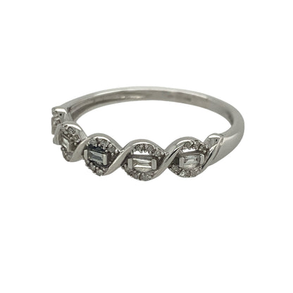 Add timeless sparkle and contemporary elegance to your jewellery collection with this pre-owned 9ct white gold diamond twist band ring, featuring a graceful flowing design with sophisticated everyday appeal—perfect for special occasions, gifting, or refined daily wear.

Design: The ring features an attractive twist band design measuring approximately 5mm wide at the front, creating a flowing and elegant appearance.
