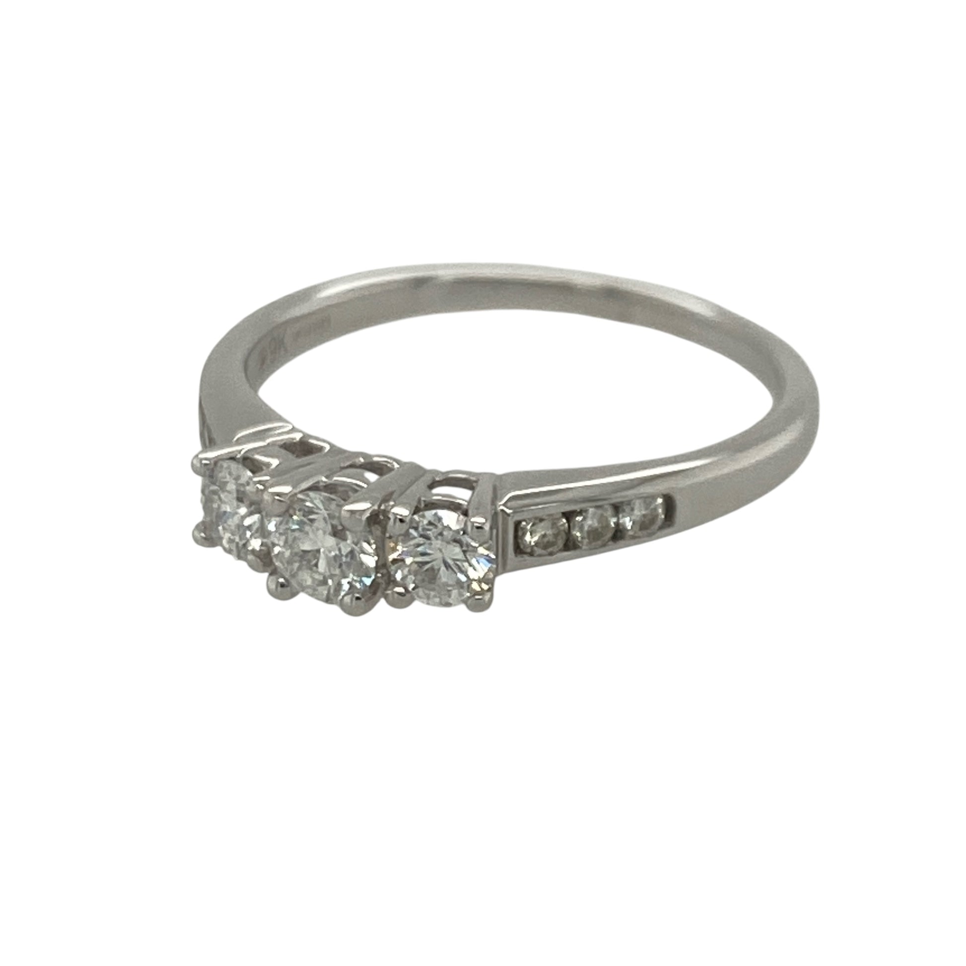 Add timeless sparkle and elegant sophistication to your jewellery collection with this pre-owned 9ct white gold diamond trilogy ring, featuring a classic three-stone design with enduring appeal—perfect for anniversaries, special occasions, or luxurious everyday wear.

Design: The ring showcases three sparkling diamonds arranged in a traditional trilogy setting, creating a beautifully balanced and elegant appearance.