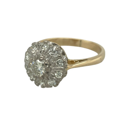 Add timeless sparkle and elegant sophistication to your jewellery collection with this pre-owned 14ct yellow gold diamond cluster ring, featuring a classic multi-stone design with impressive brilliance—perfect for special occasions, gifting, or luxurious everyday wear.

Design: The ring showcases a stunning diamond cluster arrangement measuring approximately 10mm high at the front, creating a striking focal point with exceptional sparkle and visual impact.
