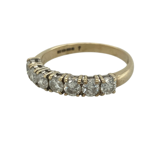 Add exceptional sparkle and timeless elegance to your jewellery collection with this pre-owned 9ct yellow gold seven stone diamond band ring, featuring an impressive display of diamonds with luxurious everyday appeal—perfect for anniversaries, special occasions, or sophisticated daily wear.

Design: The ring showcases seven sparkling diamonds set across a substantial 4mm wide band, creating a striking and beautifully balanced display of brilliance.
