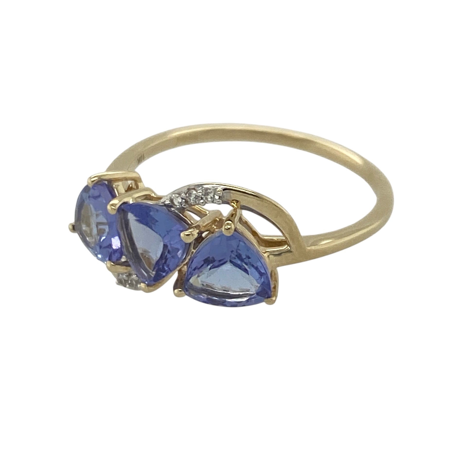 Add captivating colour and elegant sparkle to your jewellery collection with this pre-owned 9ct yellow gold tanzanite and cubic zirconia trilogy ring, featuring a striking three-stone design with sophisticated everyday appeal—perfect for special occasions, gifting, or refined daily wear.

Design: The ring showcases three beautiful triangle-cut tanzanite stones, each measuring approximately 6mm by 6mm by 6mm, creating a bold and distinctive trilogy arrangement.