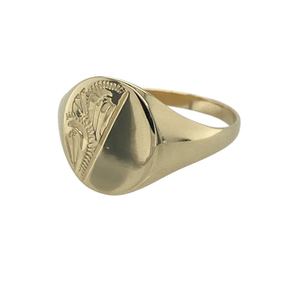 Add timeless character and classic style to your jewellery collection with this pre-owned 9ct yellow gold patterned oval signet ring, featuring a traditional design with elegant everyday appeal—perfect for gifting, formal wear, or as a distinguished statement piece.

Design: The ring showcases a classic oval signet face measuring approximately 12mm high, enhanced with attractive patterned detailing that adds texture and individuality to the design.